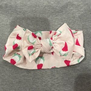 Baby bling garden gnome bow. Never worn.